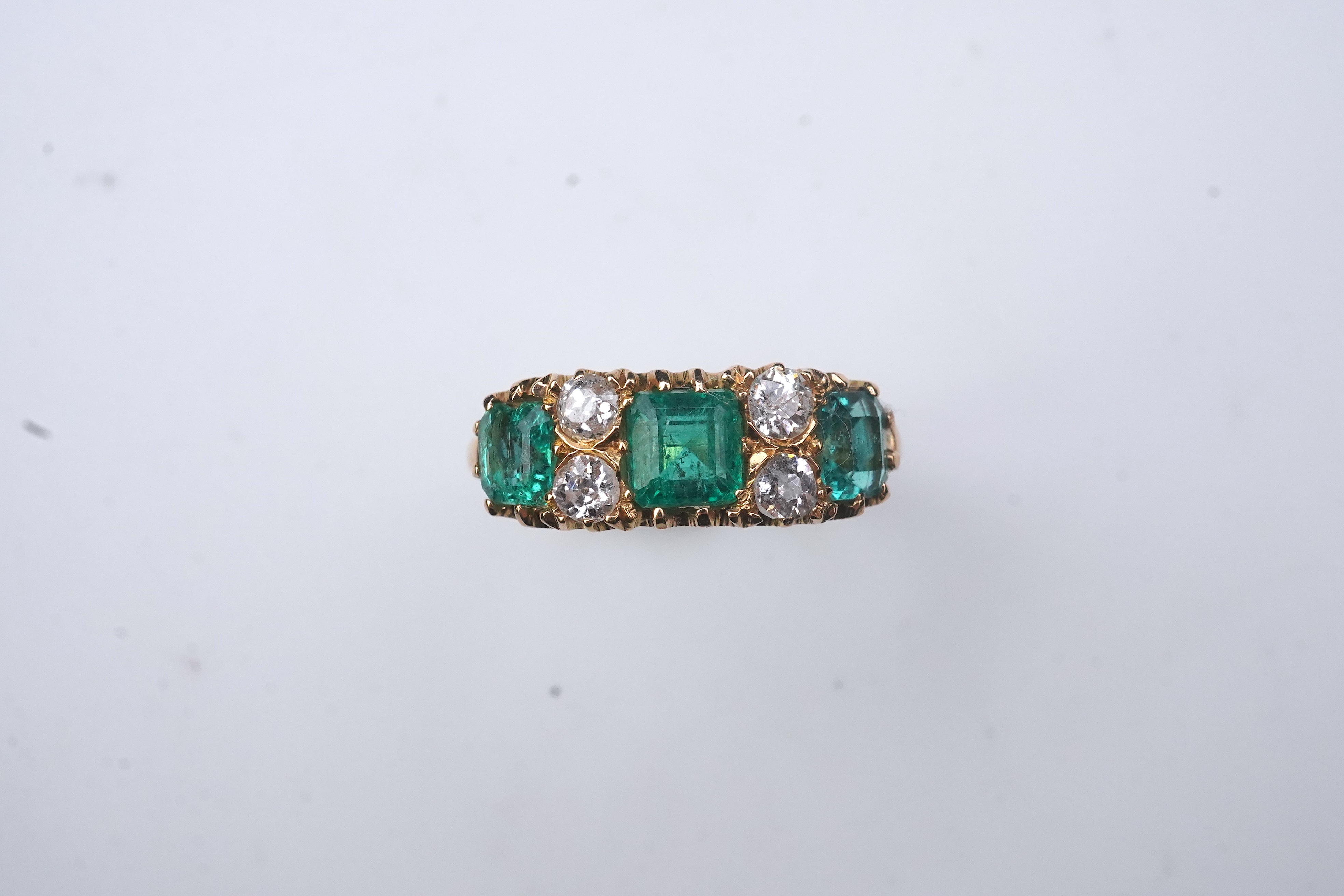 A late Victorian emerald and diamond ring, circa 1901